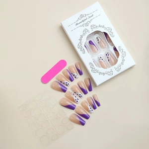 Press-on nail kit with purple leopard patterns, glitter, nail file and adhesive stickers