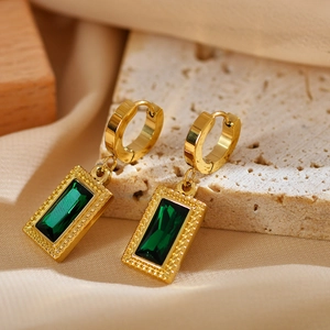 Vintage gold hoop earrings featuring emerald green rectangular zircon stones and beaded edges