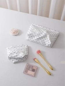Set di due pochette per trucchi in tessuto bianco a pois, dimensioni grande e piccola