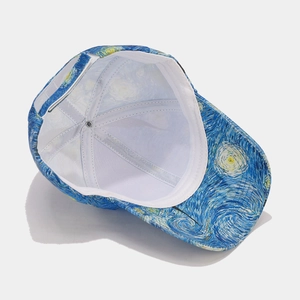 Starry Night art print baseball cap in dark blue and yellow with 45-degree top view
