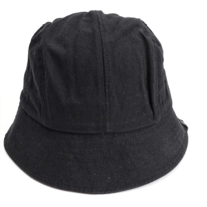 Detail view of cotton bucket hat with precision stitching on the brim and retro design