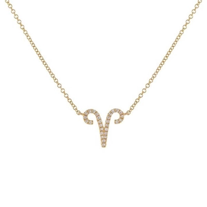 Detailed close-up of a golden Aries zodiac necklace with sparkling zircon stone accents