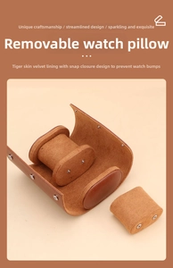Detail view of the brown leather watch roll with removable cushions and suede lining