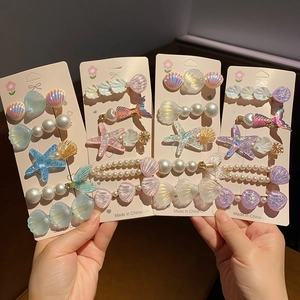 Barrettes à cheveux pour filles avec des motifs de coquillages et étoiles de mer pastel