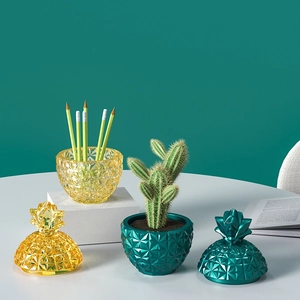 Pineapple shaped storage jars with geometric diamond facets for pens or cactus pots