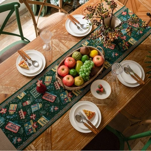 Green Christmas table runner with festive jacquard tassel decor for dining table setup