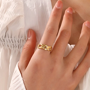 Gold hollow wave textured stainless steel ring in a minimalist hip hop geometry style