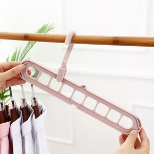 Pink multi-functional 9-hole space-saving magic clothes hanger with 360-degree rotation