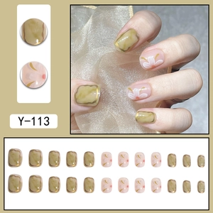 Short press-on nails set featuring amber gradient and pink camellia floral designs