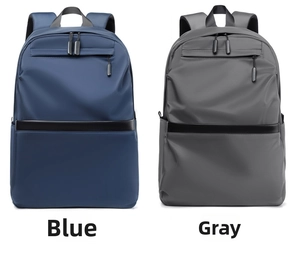 Side-by-side view of large capacity waterproof backpacks in grey and blue colors