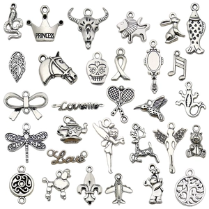 Vintage silver alloy charms assortment including bears and animals for DIY jewelry making