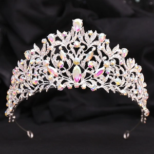 Baroque bridal crown with silver leaves and iridescent crystals on black velvet