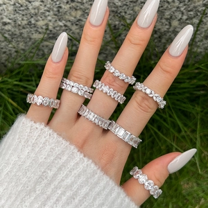 Macro shot of assorted S925 sterling silver eternity rings with sparkling zircon stones