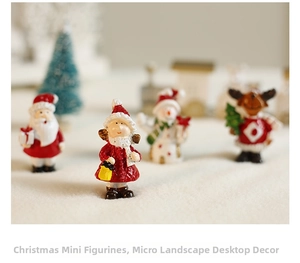 Close-up of resin Christmas miniatures with Santa, snowman, reindeer and a little girl