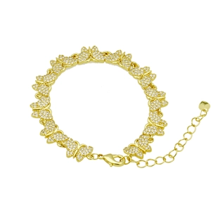 Detailed view of golden butterfly bracelet with cubic zirconia inlay and lobster clasp