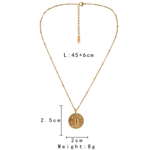 Detailed view of Scorpio zodiac coin pendant on golden beaded stainless steel chain