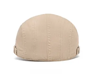 Rear view of a beige flat cap showing cotton texture and silver metal adjusters