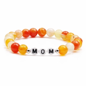 Orange and yellow agate beaded MOM bracelet with silver spacers on a clean white background