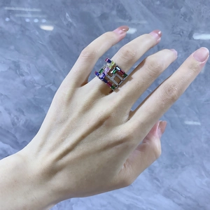 Detailed close-up of a wide S925 silver ring featuring colorful square cut zircon stones