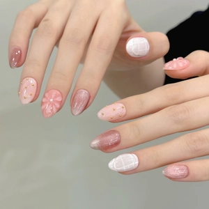 Japanese style ice flower cat eye press-on nails with 3D floral accents and pearls