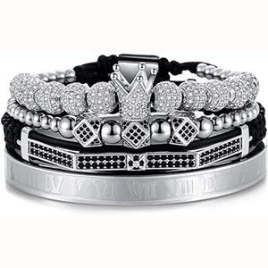Detail showing stacked men's bracelets with silver crown, cubic zirconia, and Roman numerals
