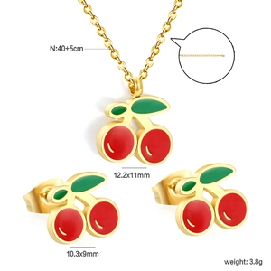 Gold stainless steel cherry jewelry set with red enamel necklace and stud earrings