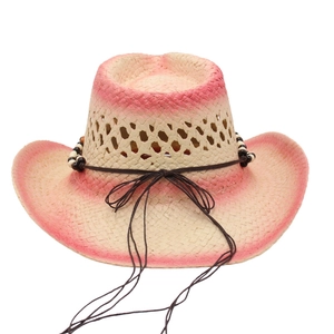 Pink gradient woven cowboy straw hat with turquoise beads and decorative string