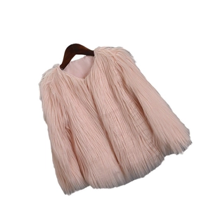 Thick pink faux fur coat for girls with soft plush texture on a wooden hanger