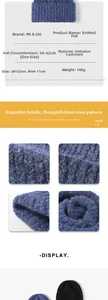 Detail view of thick knit beanie showing cashmere-like texture and 28x22cm dimensions