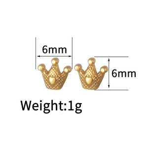 Detailed view of gold crown stud earrings with dimensions of 6mm by 6mm and 1g weight