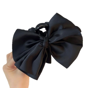 Elegant large black silk bow claw clip hair accessory for women ponytail styling