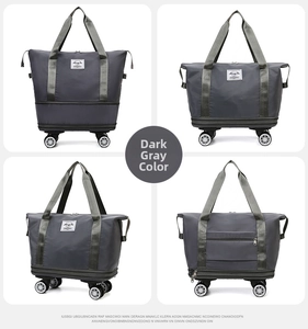 Detail view of dark grey expandable travel bag with 360 wheels and waterproof nylon