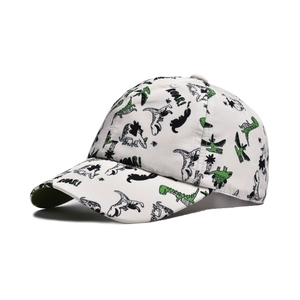 Detail view of white kids baseball cap featuring green dinosaur prints and ROAR text