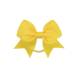 Macro detail of bright yellow grosgrain ribbon texture on an elastic bow hair tie
