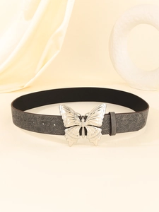 Detailed close-up of dark grey embossed floral belt with a large silver butterfly buckle