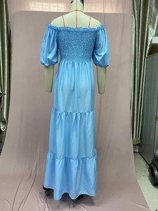 Detail of smocking back design and layered sky blue floral off-shoulder maxi dress