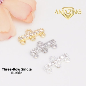 Detailed view of triple-row jewelry clasp connectors in gold and silver finishes
