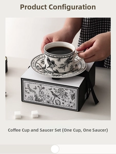 Detail of vintage ceramic coffee cup set with floral pattern and premium gift box packaging