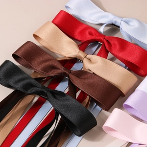 Polished satin bow hair clips with long ribbons in assorted vibrant colors for women