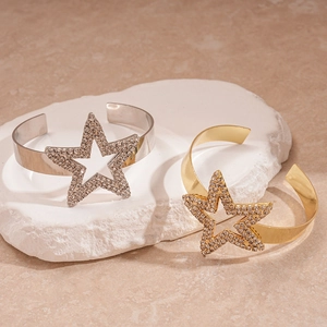 Luxurious metal star open cuff bracelet with sparkling rhinestones in gold and silver