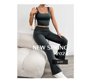 Detail of grey knitted two-piece set featuring square neck tank top and flared pants