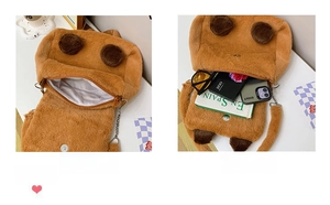 Detail showing the internal storage capacity and zip lining of the plush Capybara bag