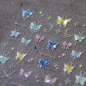 Self-adhesive laser aurora butterfly nail stickers with colorful holographic bow designs