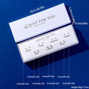 Detailed view of weekly butterfly stud earring set in gift box with size dimensions