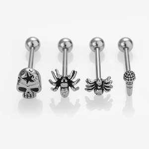 Punk style stainless steel tongue rings set featuring skull and spider designs