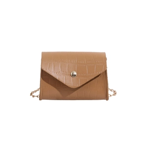 Brown crocodile pattern crossbody bag with gold chain strap on white background