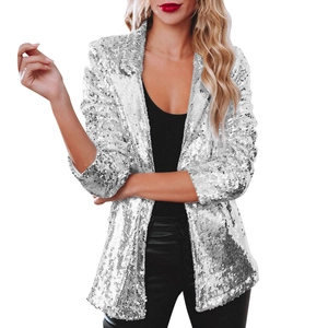 Detailed view of silver sequined blazer featuring a classic notched lapel and shimmering texture
