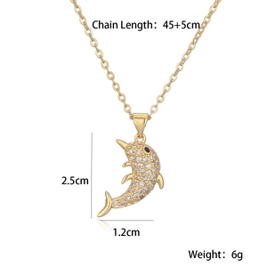 Detailed view of gold dolphin pendant necklace with size specs 2.5x1.2cm and 45cm chain