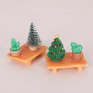 Miniature Christmas tree and cactus resin model set on orange wooden trays for DIY decor