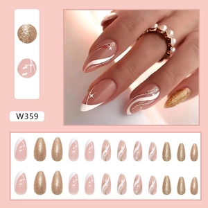 French style press-on nails with white wave patterns and rose gold glitter details